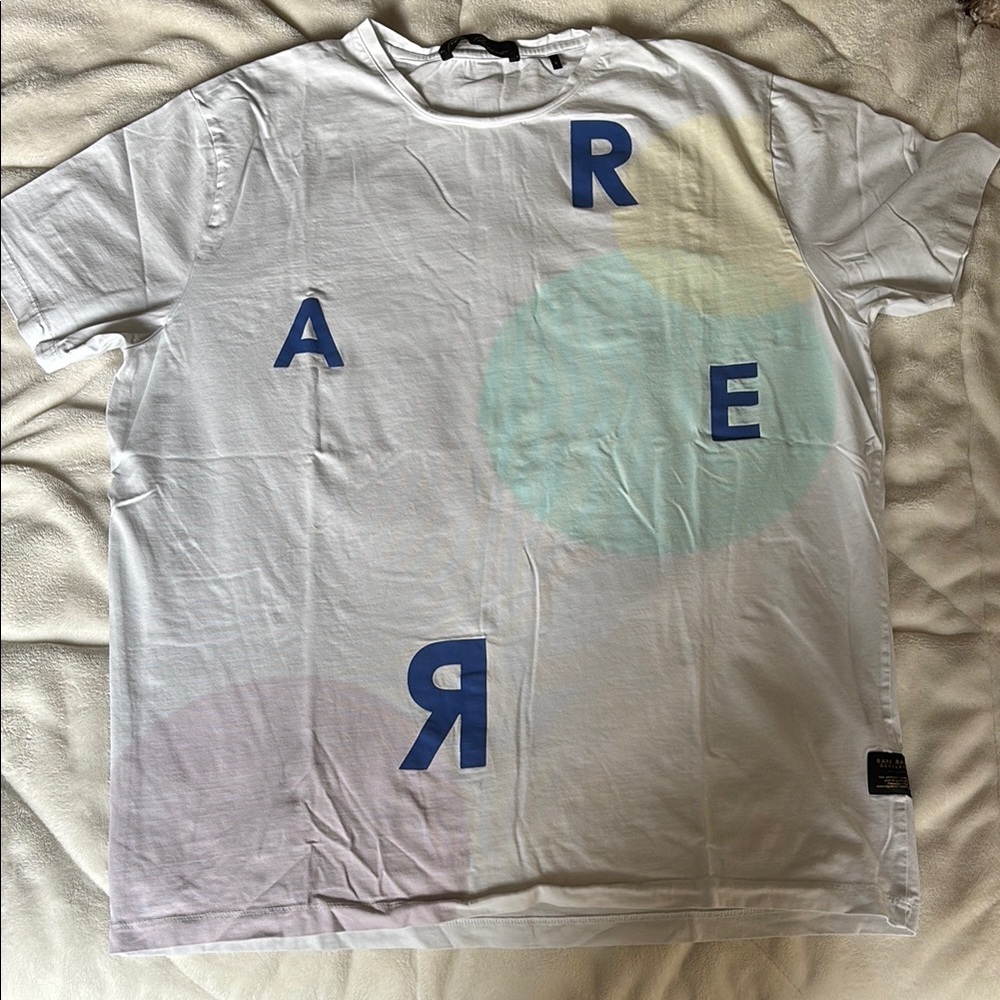White Graphic Tee with Blue Accents